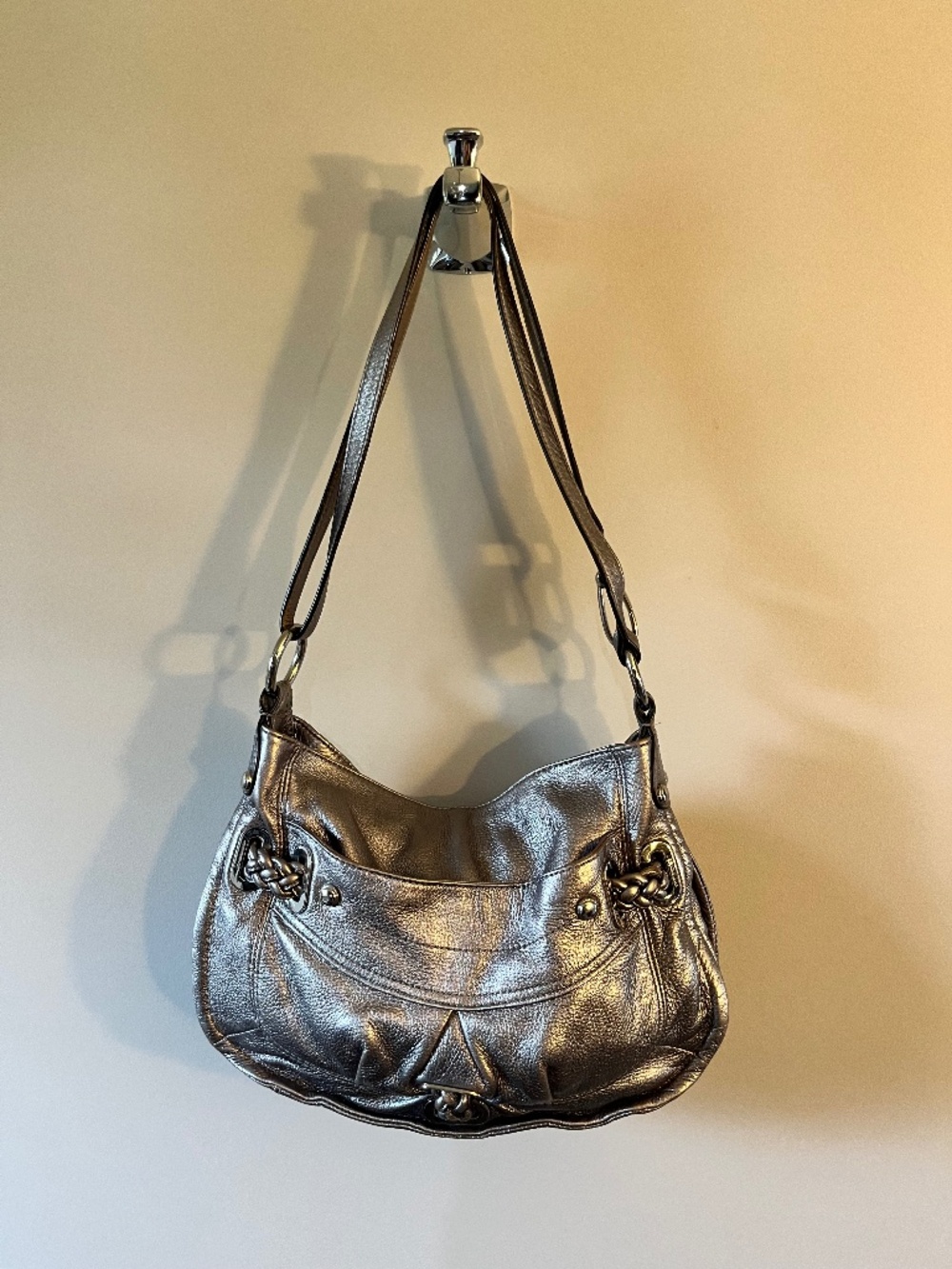 Silver leather bag by b. makowsky, braid detail